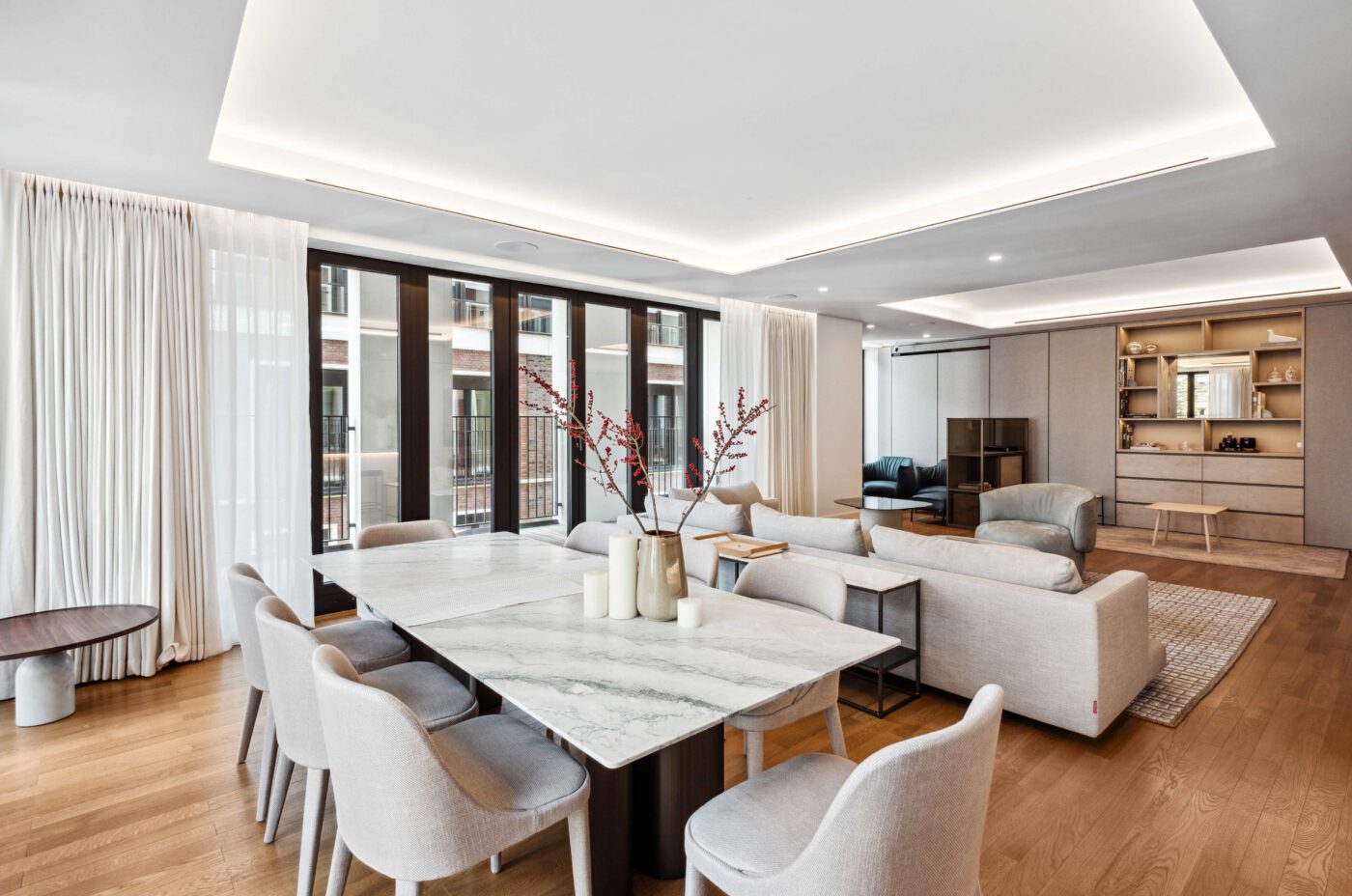Open plan living and dining room in a new build luxury apartments in london