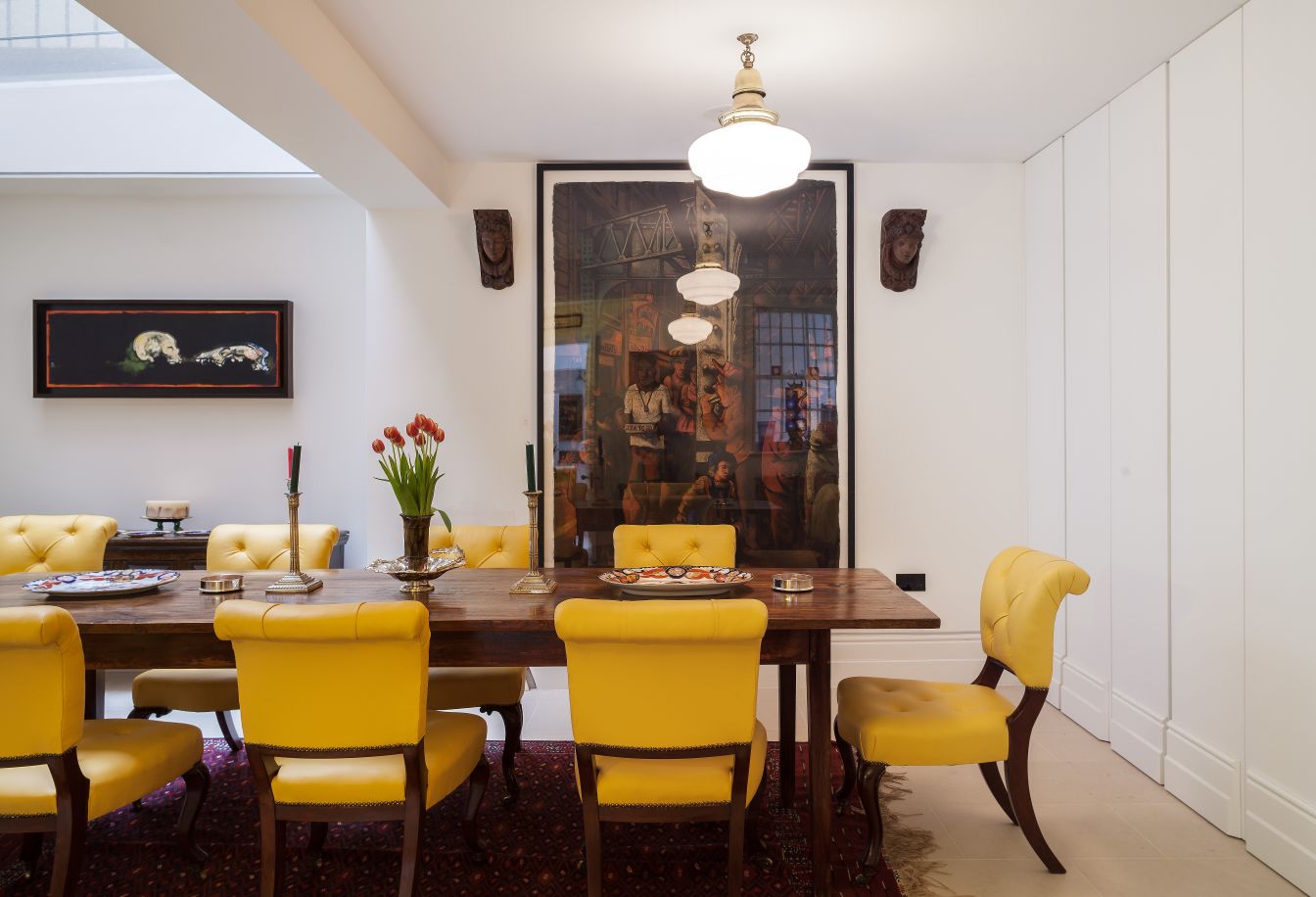 A long dining table featured in an investment property in London